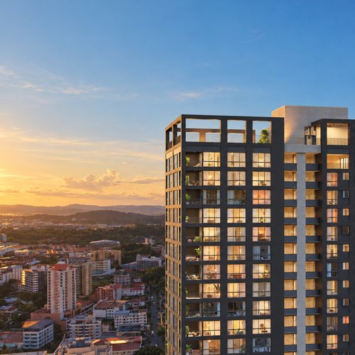 Tribu El Cangrejo condo tower at sunset over Panama City
